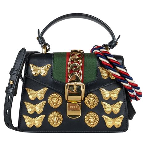 gucci sylvie animal studs mini bag